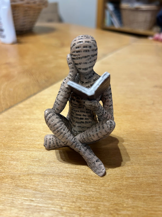 Reading Figure - Sitting Down