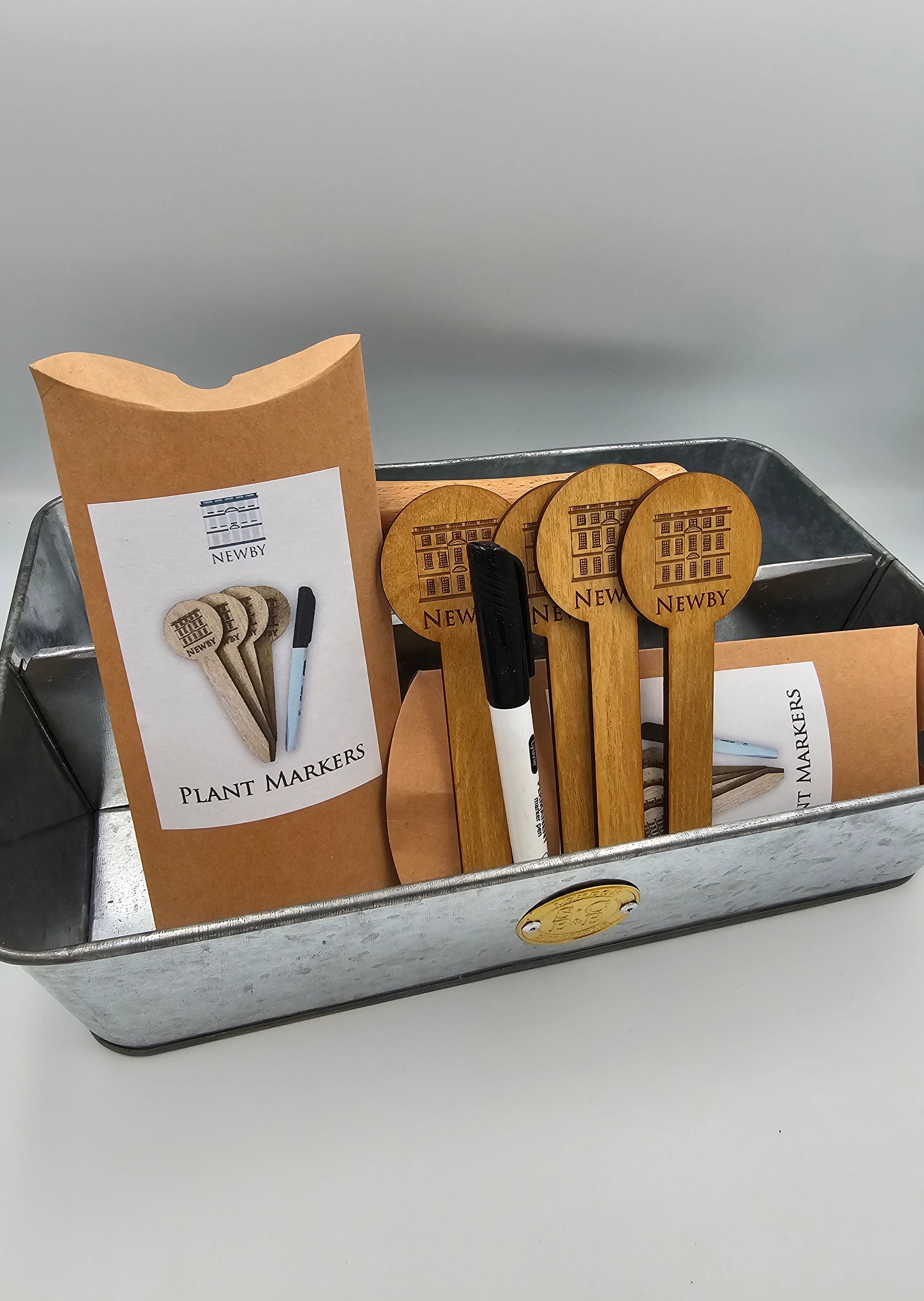 Handcrafted wooden plant markers in gardening tray by Jennyruth Workshops eco-friendly garden accessories